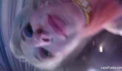 Busty cosplayer in the form of Harley Quinn has anal masturbation in the bath