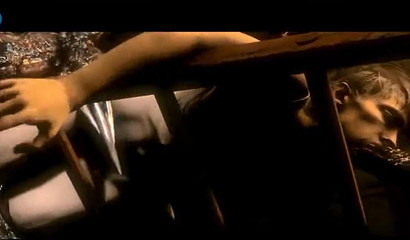 Weird zombie-like creature gapes a stunning brunette