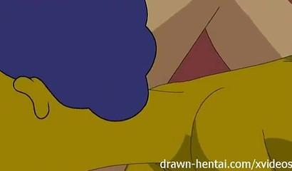 Marge Simpson fucking Lois Griffin's pussy with a strap-on